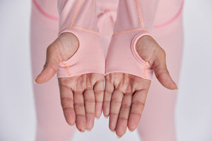 Women's Merino Ninja Suit thumb loops.