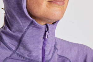 Women's Merino Ninja Suit front zip detail.