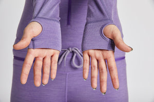 Women's Merino Ninja Suit thumb loops.